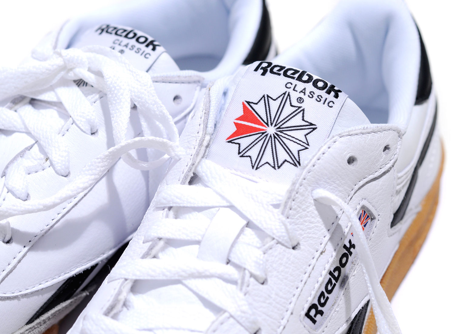 reebok revenge plus gum white