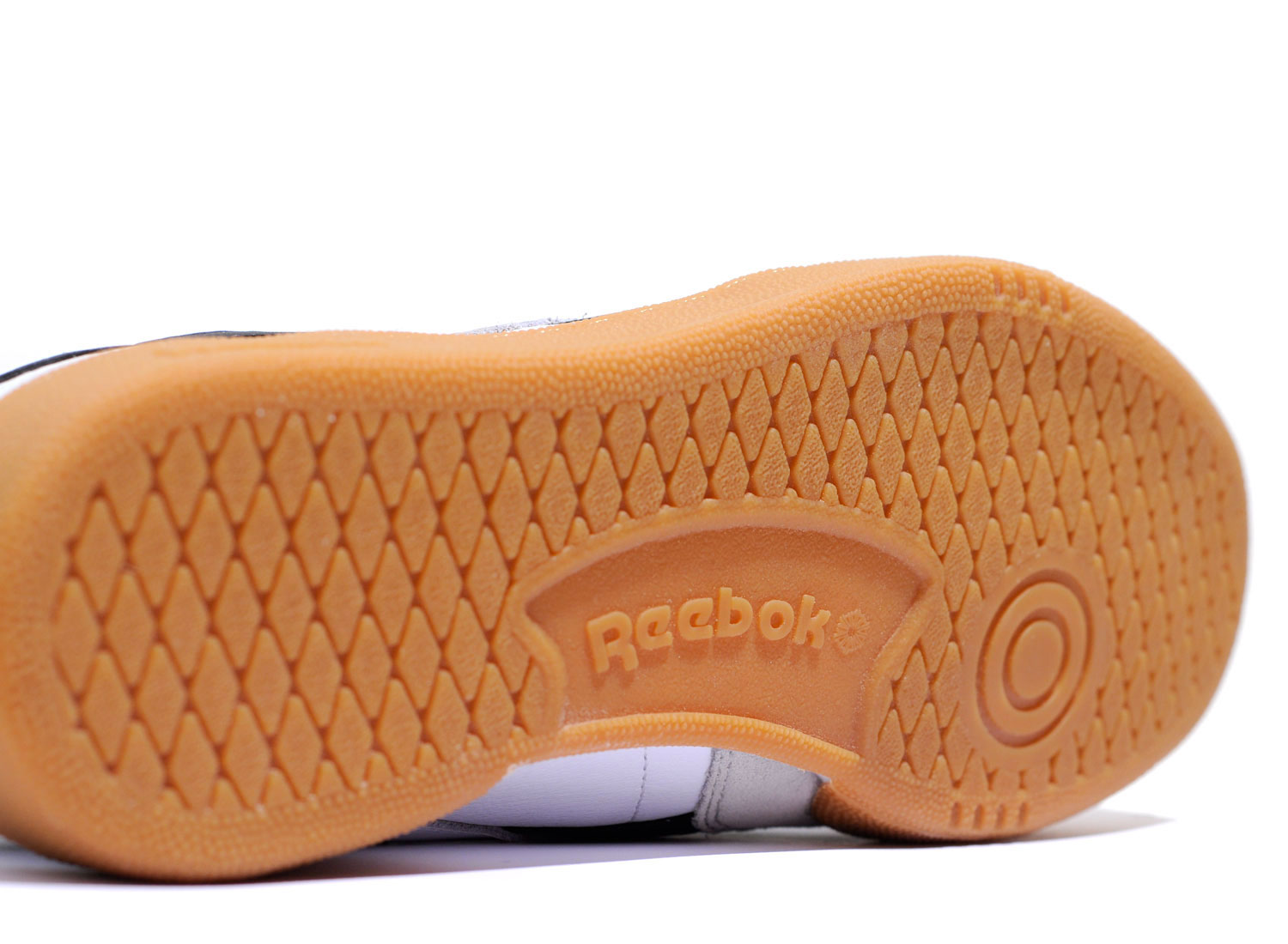 reebok revenge plus gum white