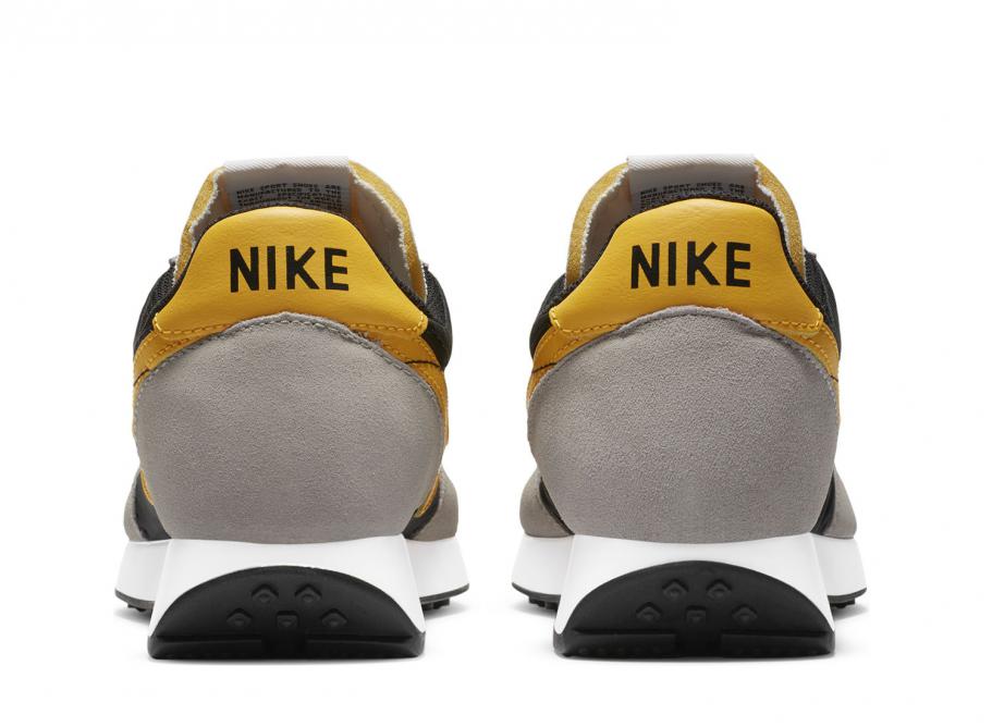 Nike tailwind gold store